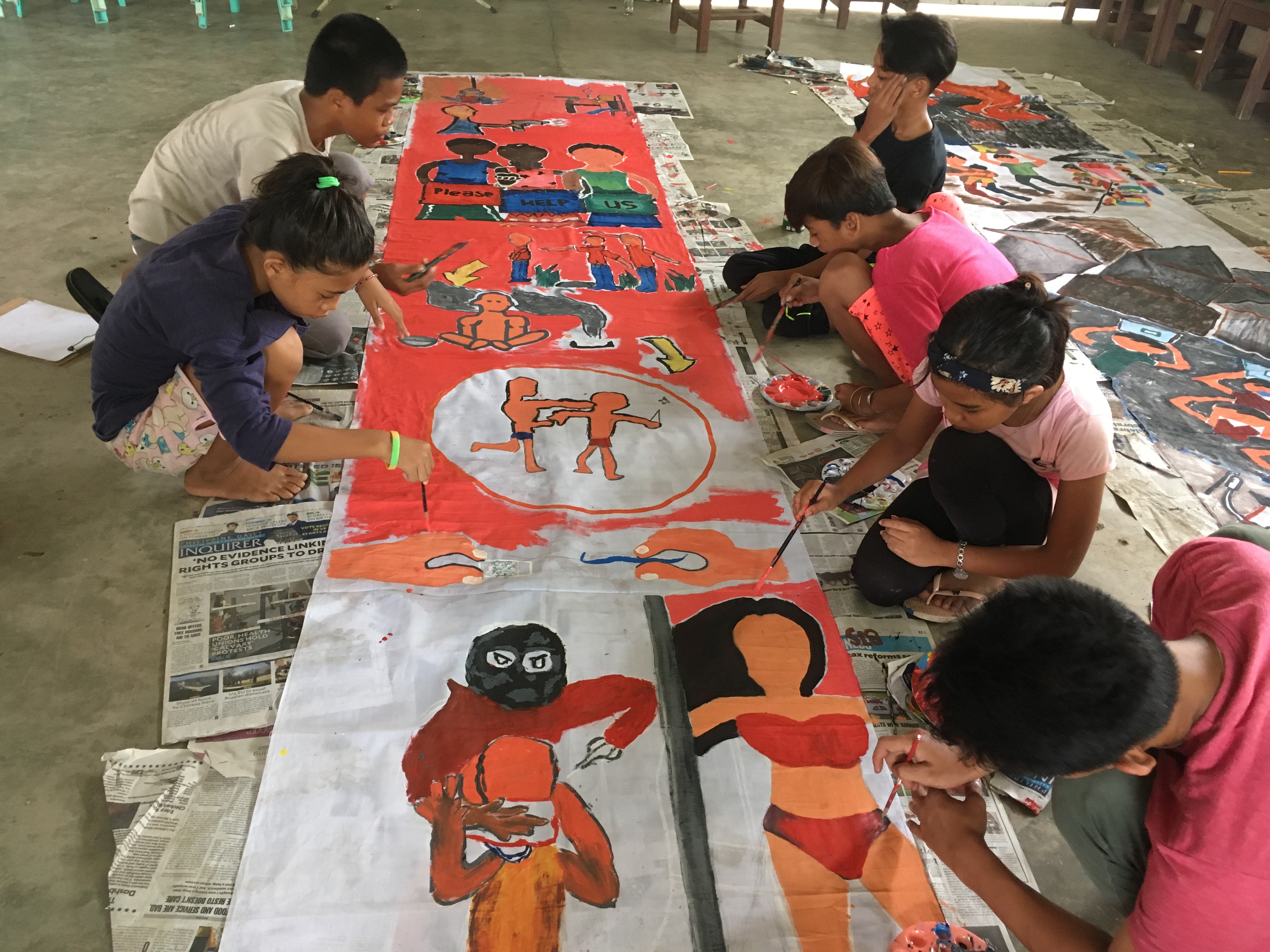 Children paint mural during Barog 2018